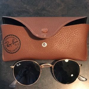 Raybans circle sunglasses
